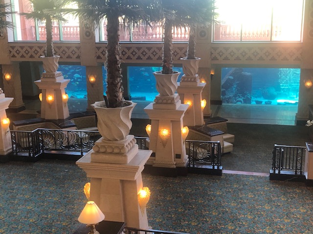 A group of lamps in the middle of an indoor pool.